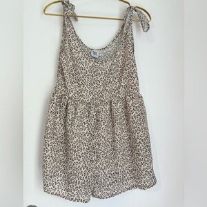 Princess Poly, size 2, cheat print romper.
